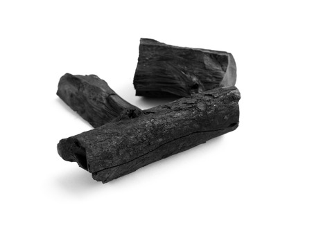 Black charcoal on white backgroundの写真素材
