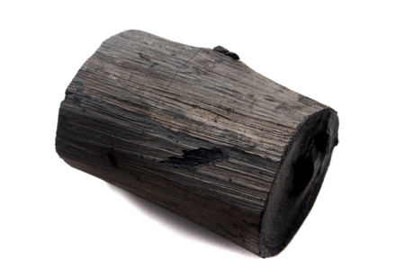 black charcoal on white background, raw material for make cookingの写真素材