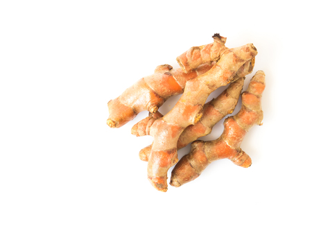 Fresh turmeric roots on white background, herb and healthy care conceptの写真素材