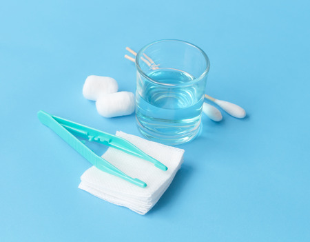 Closeup set of wound dressing on blue background, selective focusの写真素材