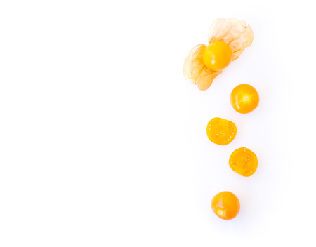 Fresh cape gooseberry fruit with high vitamin C on white background, health care medical concept, top viewの写真素材