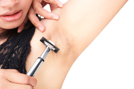 Close up woman problem armpit with razor shaving on white backgroundの写真素材