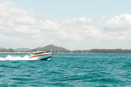 Beautiful sea with boat and blue sky, Summer and relax time conceptの写真素材