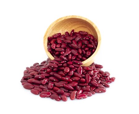 Red kidney beans in wood bowl isolated on white background, healthy food conceptの写真素材