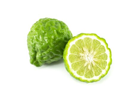 Fresh bergamot fruit slice with green leaf isolated on white background, herb and medicalの写真素材