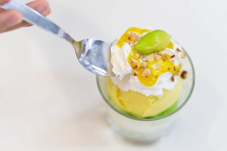 Close up mango bing su with sauces in white plateの写真素材