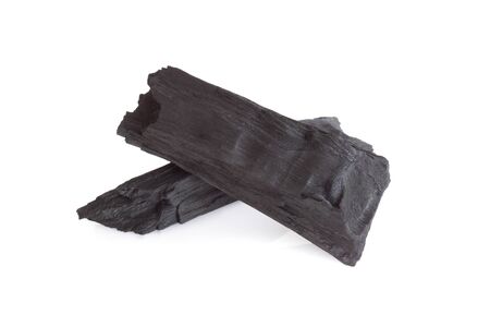 Natural black charcoal isolated on white backgroundの写真素材