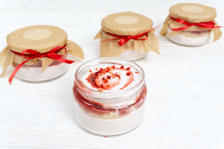 Marshmallow with jam in a transparent jarの写真素材