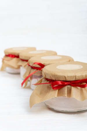 Marshmallow with jam in a transparent jarの写真素材