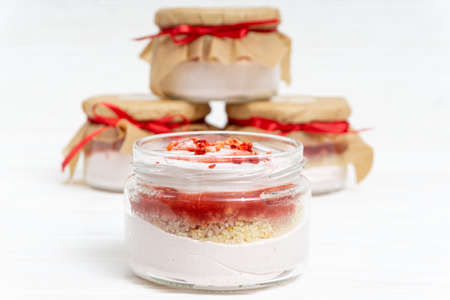 Marshmallow with jam in a transparent jarの写真素材