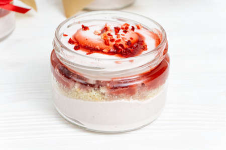 Marshmallow with jam in a transparent jarの写真素材