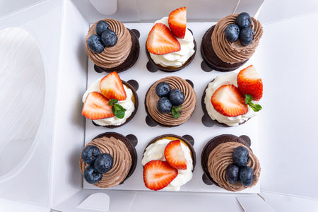 Set of cupcakes in a white boxの写真素材