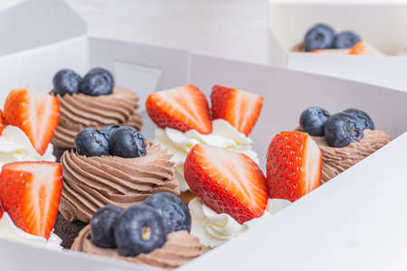 Set of cupcakes in a white boxの写真素材
