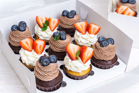 Set of cupcakes in a white boxの写真素材