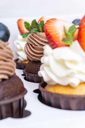 Set of cupcakes in a white boxの写真素材