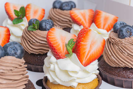 Set of cupcakes in a white boxの写真素材
