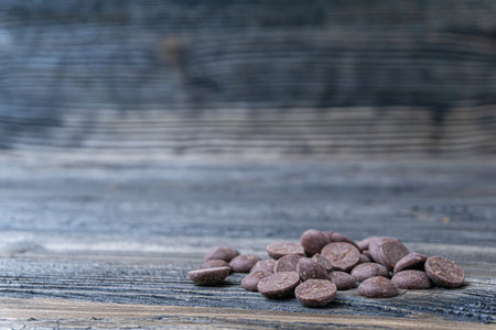 Caleta on a dark wooden background with texture
