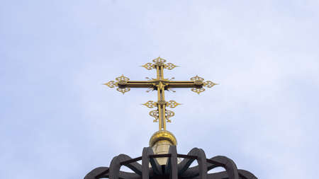 Golden cross on top of the church in the city of Novorossiysk