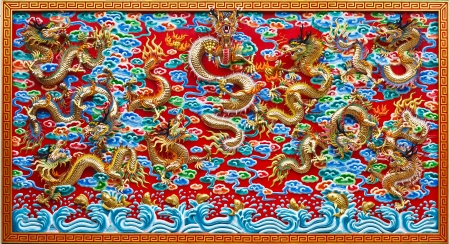 Golden dragon on the wallの写真素材