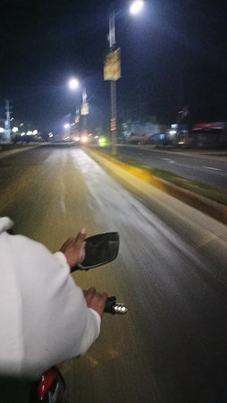 Driving on a highway at night in the city of Salvador.の写真素材