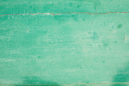 Old painted green wood boardの写真素材