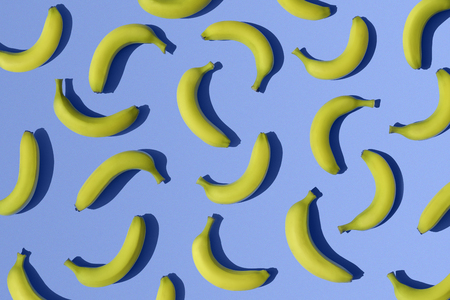 Bananas on blue backgroundの写真素材