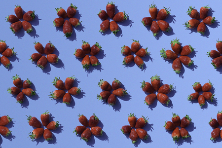 Strawberries on blue backgroundの写真素材