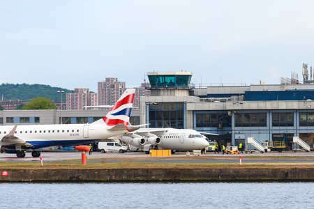 A British Airways and City Jet airplanes at London City Airport.のeditorial素材