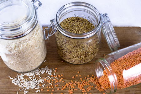 Rice, lentils and quinoa in jarsの写真素材