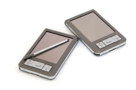 2 PDA on white, isolated, with one having stylus on screen