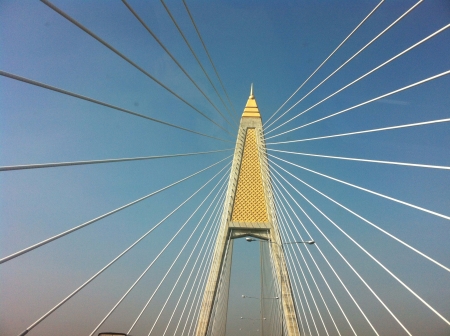pole and cables of bhumibol bridge from below bangkok thailandの素材