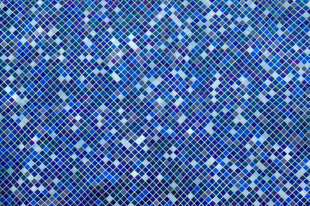beautiful mosaic tiles pattern in swimming pool background texture