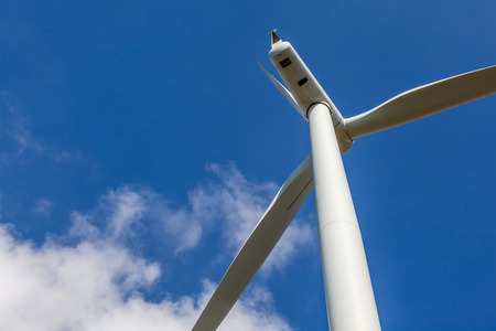 Close up of Wind turbine producing alternative energy in wind farm Thailand, for renewable electric...