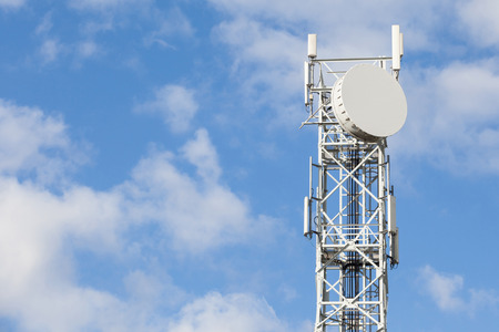 Telecommunications antenna tower for radio, television and telephony with beautiful blue sky.
