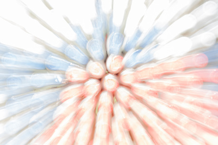Blurred photo of many pattern bottle stoppers.