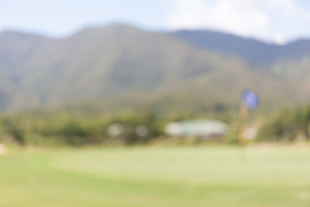 Abstract blurred background of green golf course.の写真素材