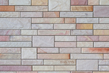 Exterior white and brown brick wall, textured wall background.の写真素材