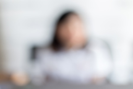 Unrecognized woman in conference event hall, business concept.の写真素材