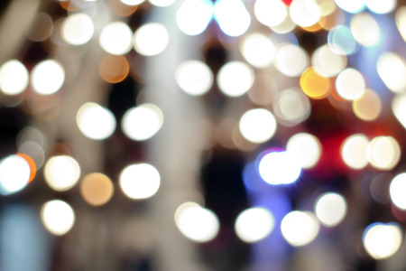 Abstract blurred bokeh of traffic night in big city.