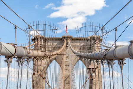 Upward view of Brooklyn Bridge in New York City.の写真素材