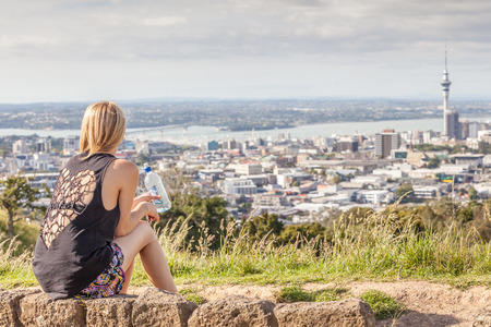 Auckland, New Zealand- December 12, 2013. Woman seeing the beautiful cityscape of Auckland.のeditorial素材