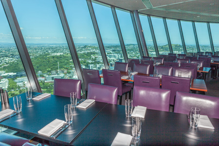Auckland, New Zealand- December 12, 2013. Preparing table and dinner set in restaurant of New Zealand Sky tower.のeditorial素材