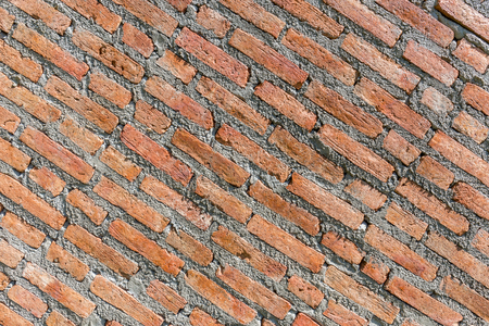 Texture of exterior red brick wall stucco background.の写真素材