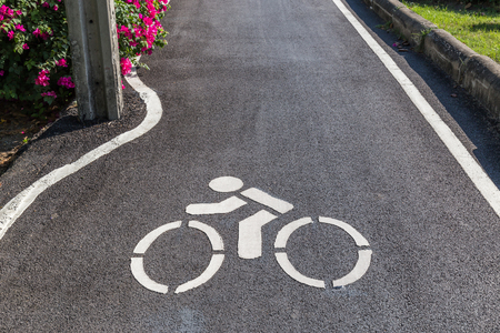 The lane for bicycles and info sign marked on the street, ecology concept.の写真素材