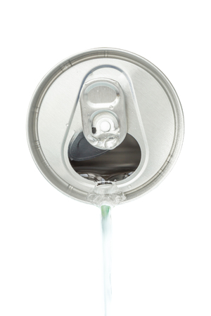 Top view of white soda pouring from the aluminum beverage can on white background.の写真素材