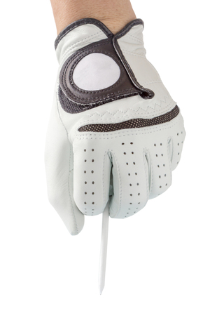 Action of golfer hand in white glove and the golf ball with tee ready to place on ground with white background.の写真素材