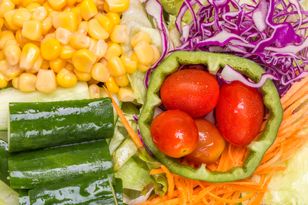 Detail of chilled colorful mix and fresh vegetables salad, diet and healthy food concept.の写真素材