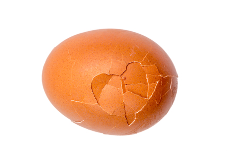 Detail texture of broken boiled egg isolated on white background.