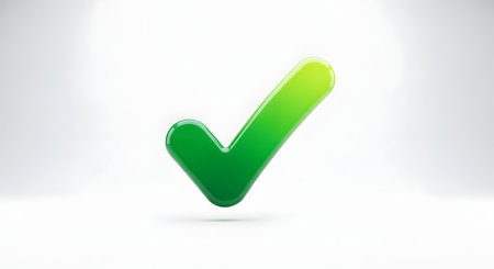 A glossy, three-dimensional green checkmark symbol is shown floating against a clean, white studio background. The icon represents approval, success, completion, and correctness, with a modern and polished look.の素材