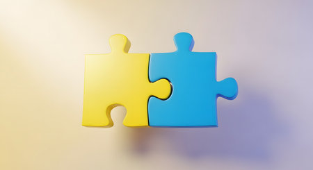 Two interlocking jigsaw puzzle pieces, one yellow and one blue, are perfectly fitted together against a softly lit background. This minimalist 3D render symbolizes connection, solutions, teamwork, partnership, and unity.の素材